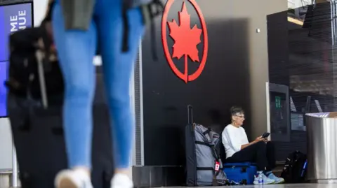 Air Canada retoma voos após acordo preliminar com comissários de bordo - Imagem do artigo original